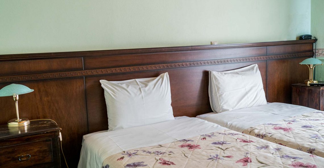 standard-double-room-two-single-beds-room-blue