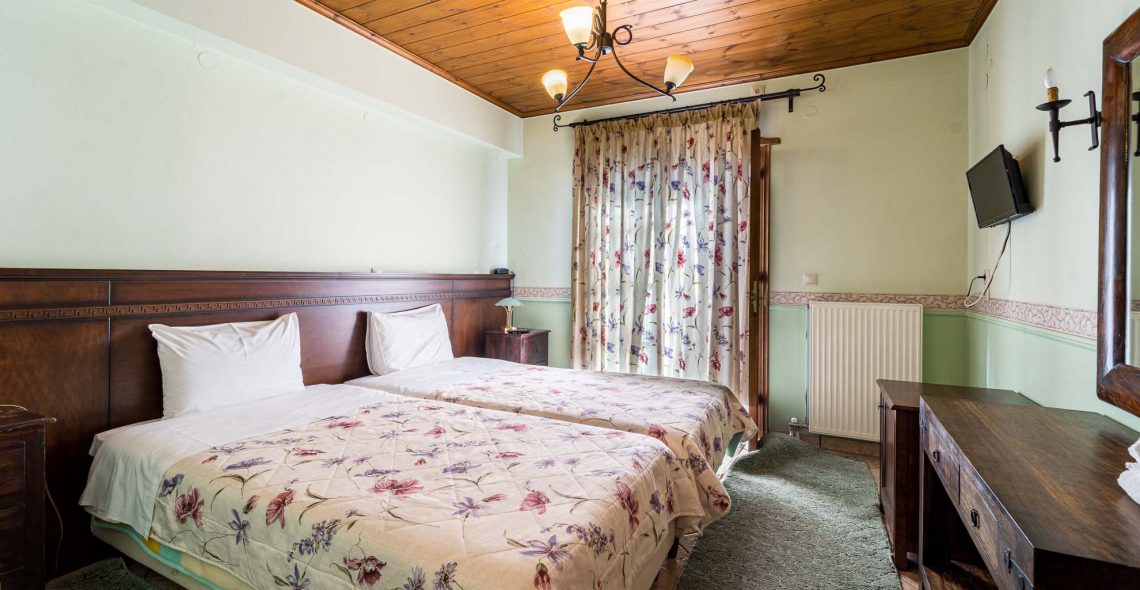 standard-double-room-two-single-beds-room-blue-room